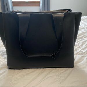 a new day Black Tote Bag